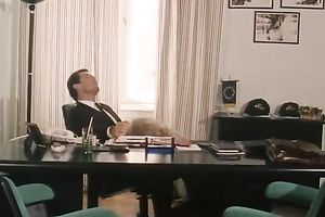 Hot blond secretary gives head to her stylish boss