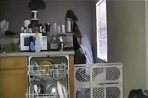 Sexy swarthy white bitch cooking breakfast in her satin pants