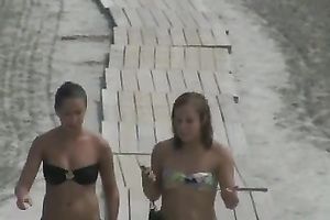 Pretty angels weaing bikinis acquire caught on a voyeur's web camera