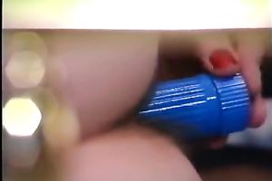 Two classic lesbos playing with giant fake penis