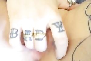 Tattooed emo beauty masturbates her pierced fur pie with fingers