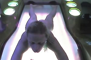 Fuckable golden-haired slut was caught on hidden webcam in solarium