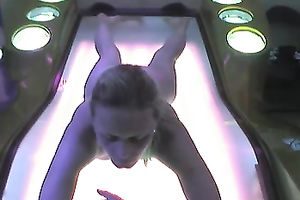 Fuckable golden-haired slut was caught on hidden webcam in solarium