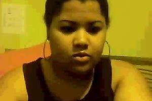 Chubby mulatto playgirl sucks her fingers and fondles her big tits