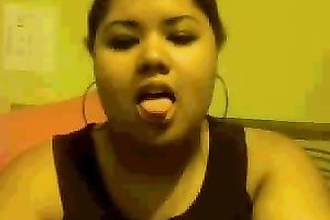 Chubby mulatto playgirl sucks her fingers and fondles her big tits