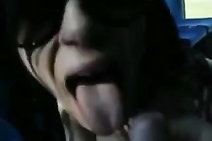 Sassy babe in glasses gives desirous oral pleasure in a public place