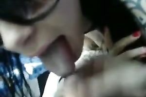 Sassy babe in glasses gives desirous oral pleasure in a public place