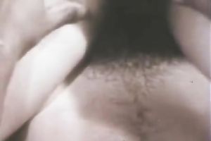 Extremely hirsute dark brown gal rides a white dude on top