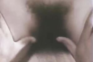 Extremely hirsute dark brown gal rides a white dude on top