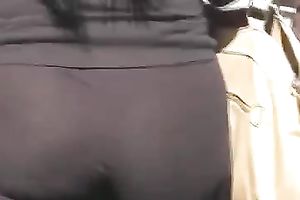 Lovely latin babe arse in dark constricted panties wiggling on the street