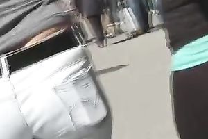 Lovely latin babe arse in dark constricted panties wiggling on the street