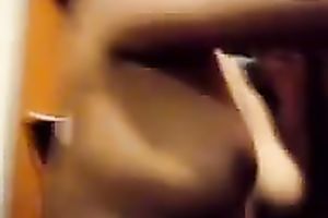 Asian hooker is fresh out of shower wrapped in a towel