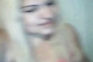 White trash aged floozy plays with her marangos on livecam