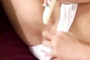 Brown-haired cutie plays with her pants in solo scene