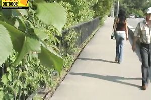 Sexy brunette hair playgirl in jeans can't live without pissing on the stairs