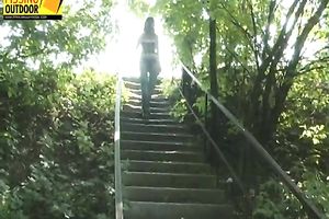 Sexy brunette hair playgirl in jeans can't live without pissing on the stairs