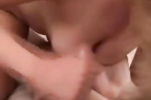 Chubby short haired black cock slut gives excellent tugjob and takes facial