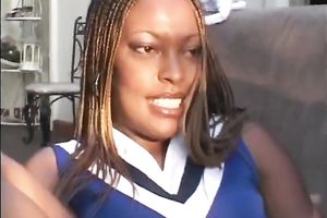 Sexy and sassy dark milf dresses up like a cheerleader