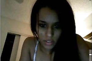 Hot black skin brunette hair legal age teenager wears no pants on web camera