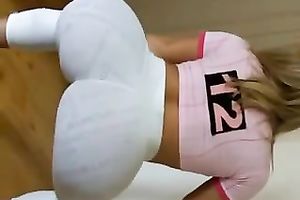 Hot blond honey in her yoga panties showing off her wazoo and bazookas