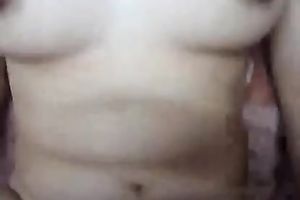 Flamboyant brunette hair wench receives her unshaved muff nailed hard in missionary style