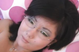 Naughty Asian hawt hotwife filmed exposed on the sofa