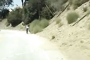 Curly-haired bitch gives her guy a worthwhile oral-service in his car