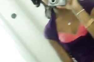 My cute ebon girlfriend in white pants tapes herself in bath