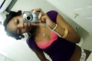 My cute ebon girlfriend in white pants tapes herself in bath