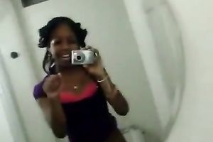 My cute ebon girlfriend in white pants tapes herself in bath