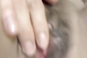 Skanky Korean hoe copulates her taut cookie with her vibrator