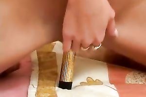 Zesty blond sweetheart with constricted body pets her chocolate hole with sex toy