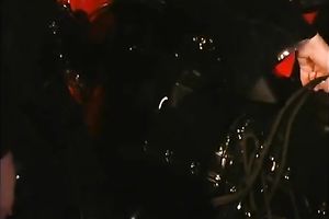 Fetish excited sweetheart in her constricted leather costume is a way also perverted