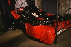 Fetish excited sweetheart in her constricted leather costume is a way also perverted