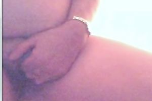 Mature Belgian woman masturbates her large limp vagina