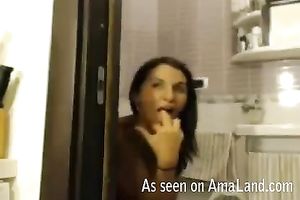 Busty hot brunette in red underware greedily blows appealing lollicock