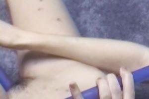 Tight dark haired floozy plays with hot wax and masturbates with candle