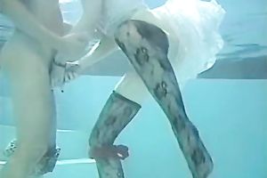Red head indecent slut sucks pecker below water in pool