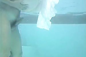 Red head indecent slut sucks pecker below water in pool