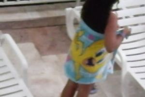 Teen brunette hair latin chick honey on the lounger by the pool