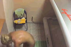 Hidden web camera movie of one torrid curvy blondie in solarium