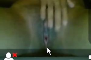 Petite swarthy chick rubs her bald constricted fur pie on the web camera