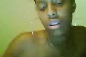 Petite swarthy chick rubs her bald constricted fur pie on the web camera