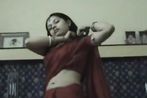 Sucking my enjoyable Indian wife's natural scoops during the time that filming it