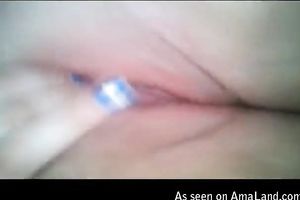 Video of excited big beautiful woman playing with her pink fur pie by diving her fingers unfathomable in