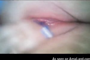 Video of excited big beautiful woman playing with her pink fur pie by diving her fingers unfathomable in