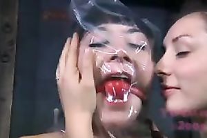 Wicked dominatrix-bitch puts a plastic bag over her slave's head