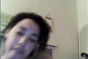 Cute pale skin juvenile brunette hair gently touches herself