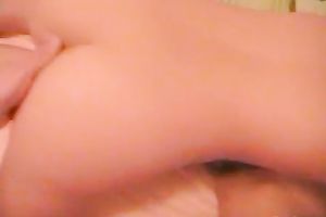 Two fleshly Asian lesbos are rubbing against every other