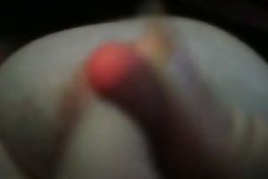 Mature neighbor playing with large firm teats intensively